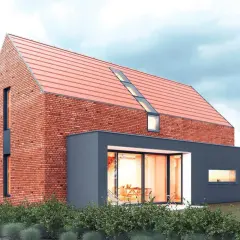 Nowoczesny projekt domu stodoła z cegły i grafitowego tynku. Duże okna, skośne świetliki i czerwony dach.