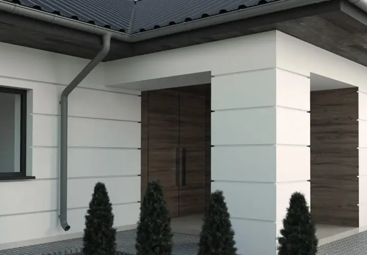 Nowoczesny dom z białymi panelami i drewnianymi wstawkami. Elewacja z subtelnymi wzorami podkreśla architekturę.
